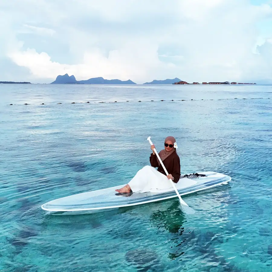 Guest enjoying a sea kayaking session in the lagoon Dayang Resort